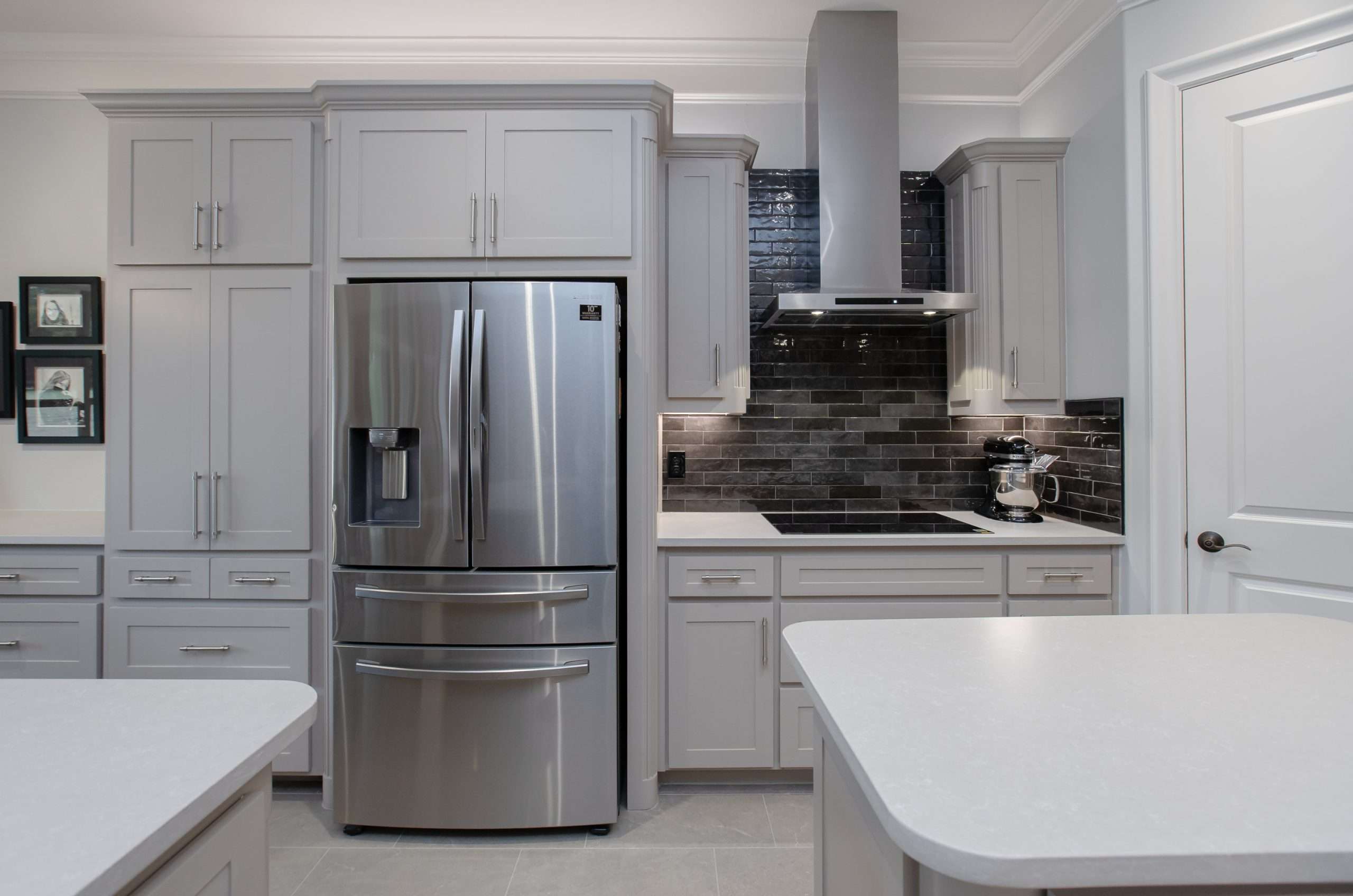 Mid-range kitchen remodel with gray cabinets and quartz counters in Denton, TX